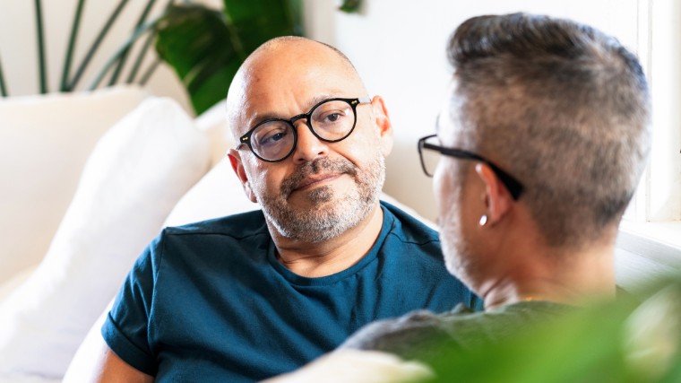 Man and his partner having a serious conversation.