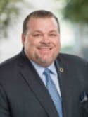A corporate headshot of Jim Triggs.