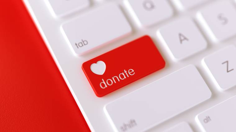 laptop with a "donate" button