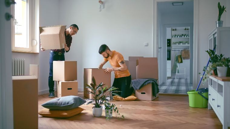 Couple moving into new home.