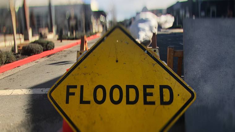 road flooded sign
