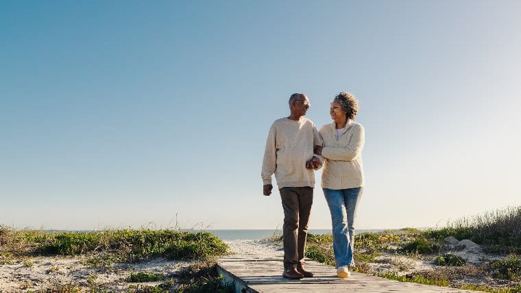 Senior couple going for a walk together.