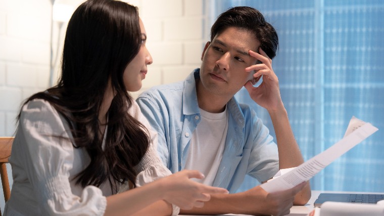 Young couple having a tense conversation.