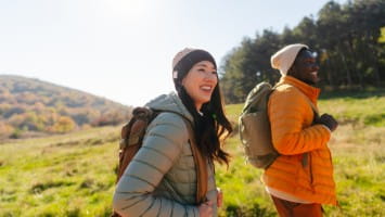 Happy couple hiking.