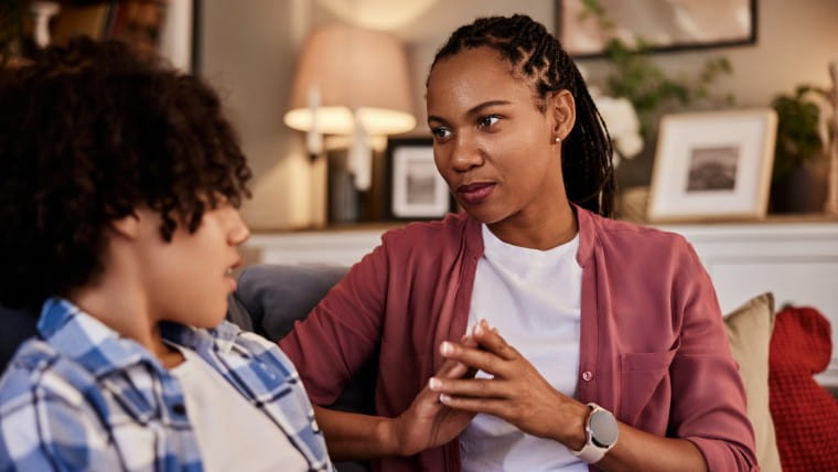 Mother talking to teenaged son.