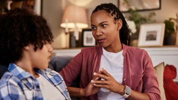 Mother talking to teenaged son.