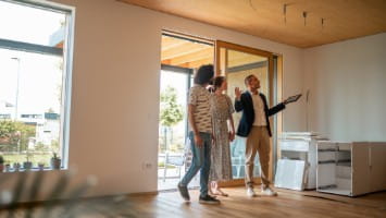 Couple touring a home for sale.
