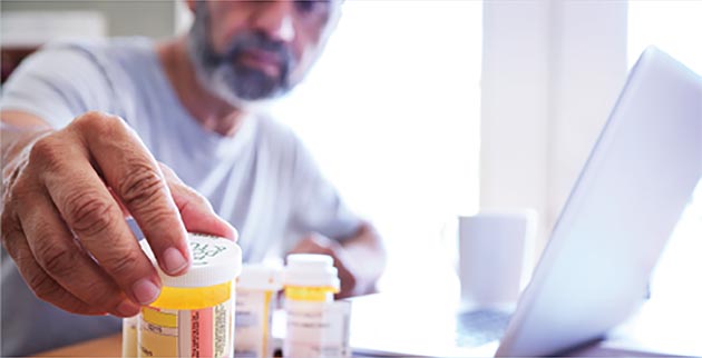 Man Reaching for Medicine