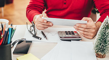 An entrepreneur at the site of a renovation