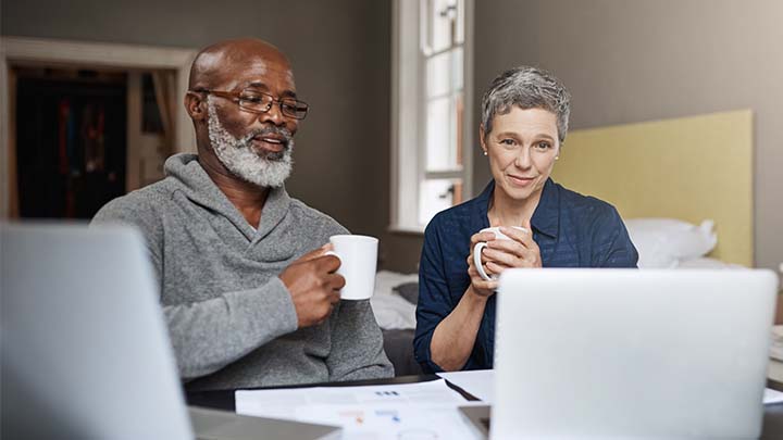 Older couple looking at computer