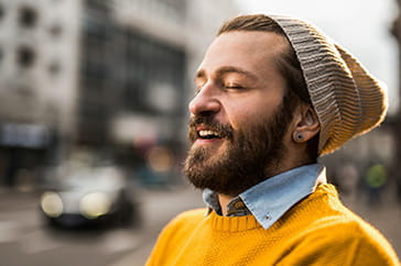 Man enjoying a peaceful, happy feeling
