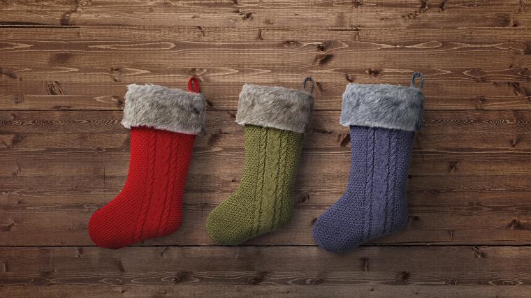 a row of empty Christmas stockings