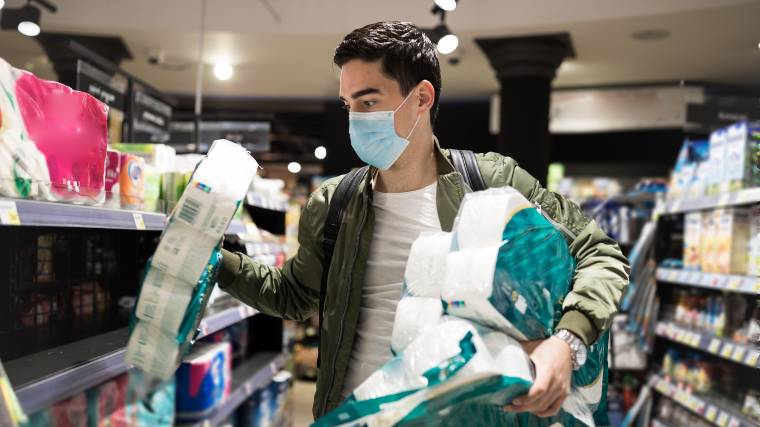 man making questionable decisions in the grocery store