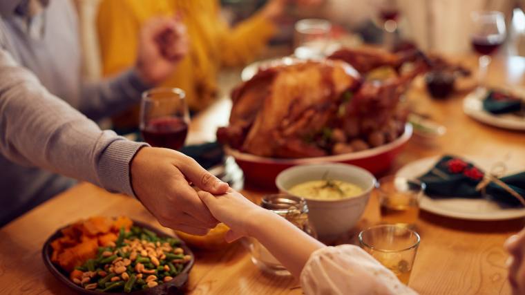 A table with Thanksgiving food.