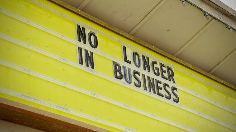 A sign reading "No longer in business."