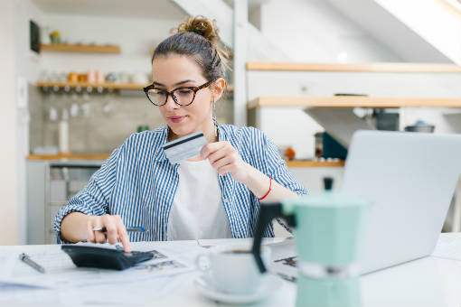 Woman reviewing her credit card debt