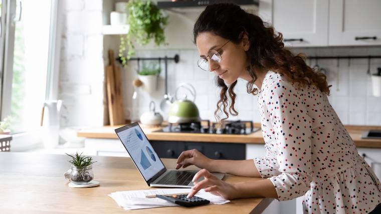 Woman checking her investments online.