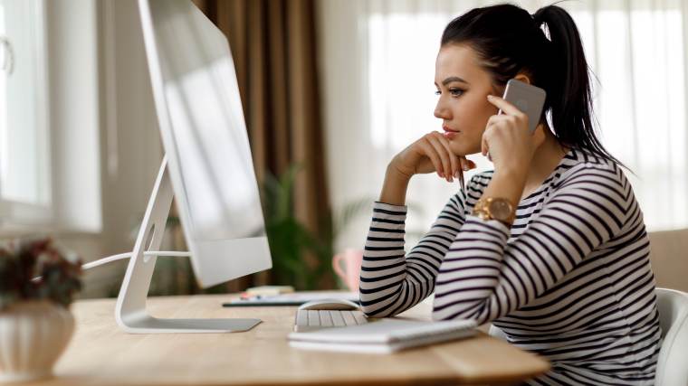 Woman on the phone with a creditor.