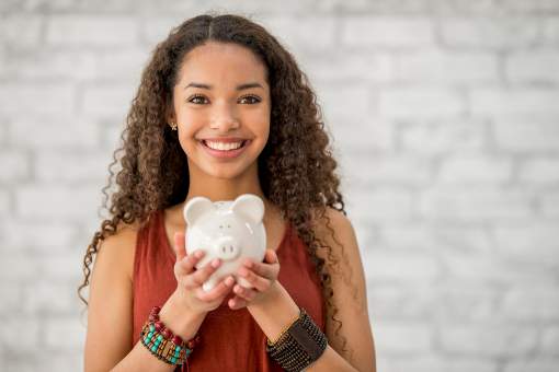 Young woman saving money