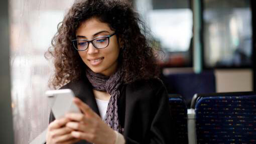 Woman checking text messages on her phone