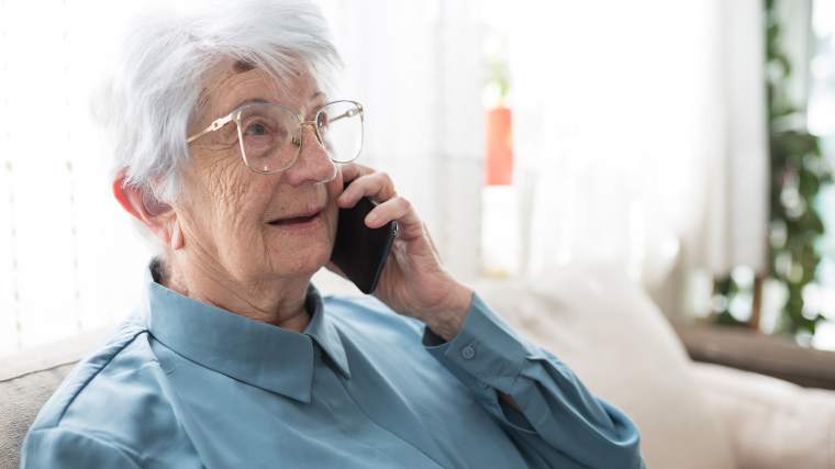 Senior woman talking on her phone.