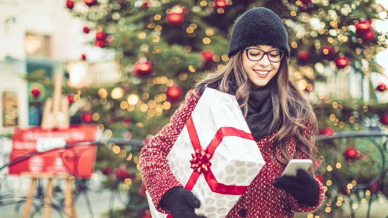 holiday shopper checking for deals online