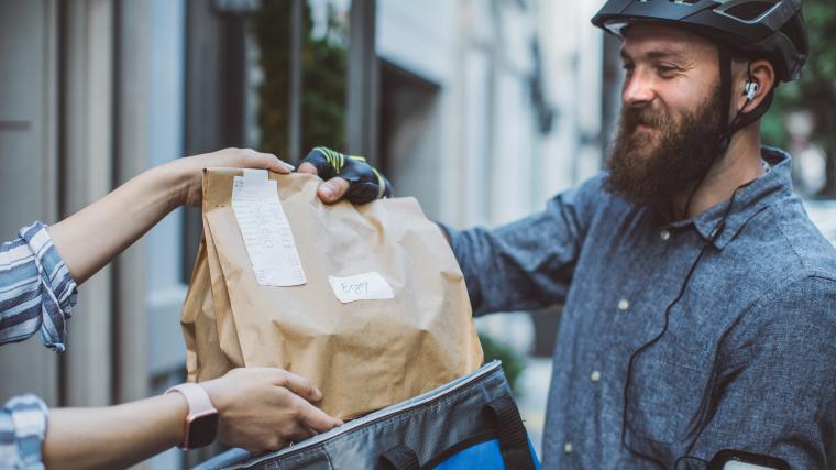 Man delivering food to customer