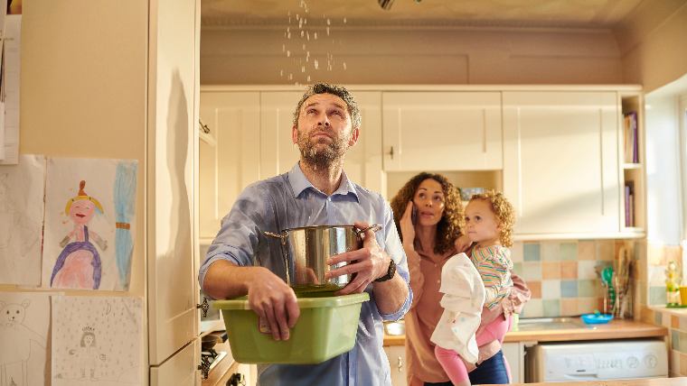 Family dealing with flooding house.