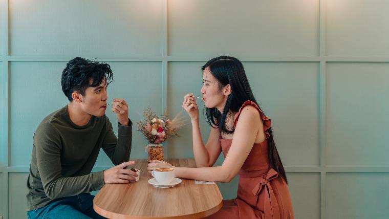 Couple on a date in a cafe.