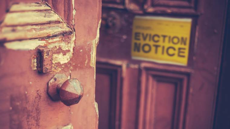 Eviction notice hanging on a door