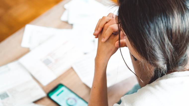 Woman reviewing financial documents