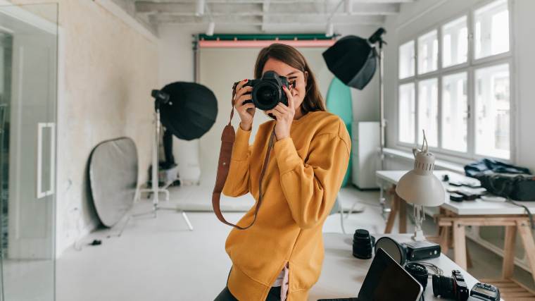 a freelance photographer in her studio