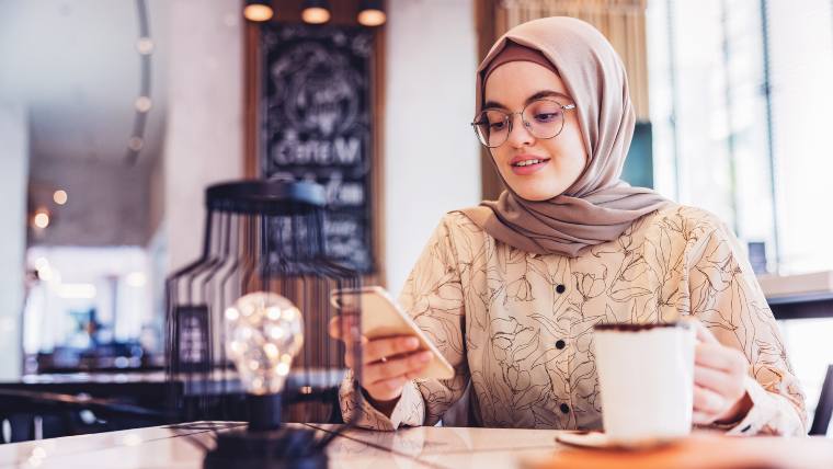 Young woman checking her phone.