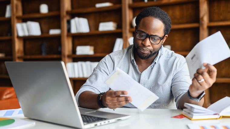 Man reviewing his bills.