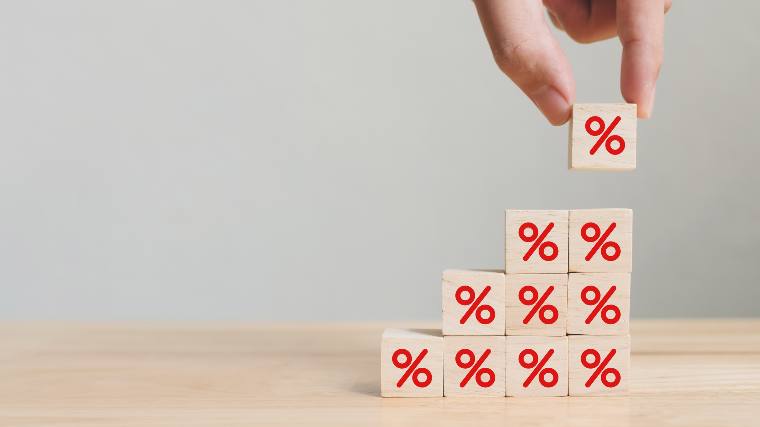 Stack of interest rate signs.