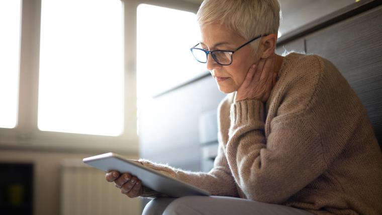 adult woman using a tablet