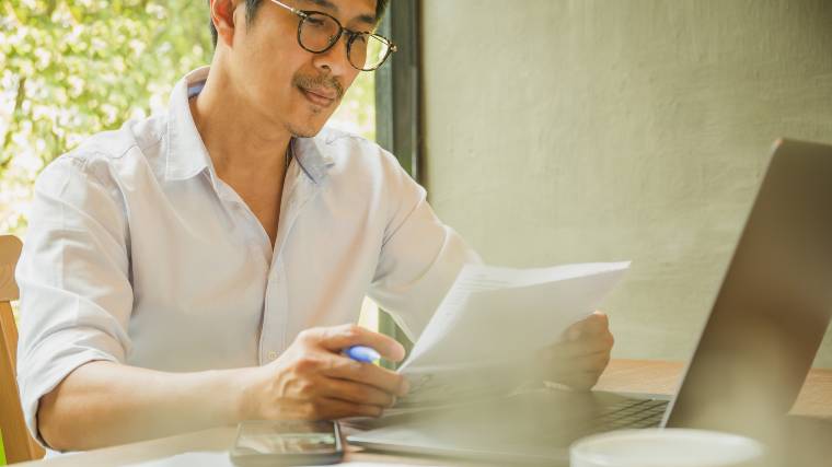 man reviewing his bills