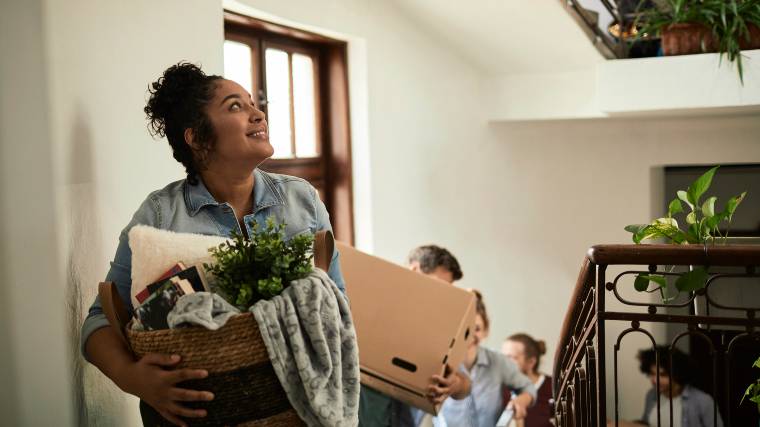 young adult moving into a new apartment