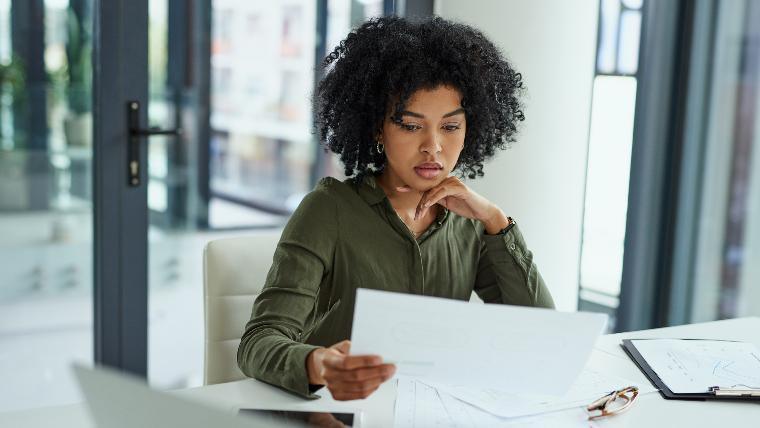 Woman reviewing her balance sheet.