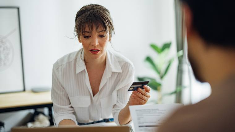 Couple reviewing bills together.