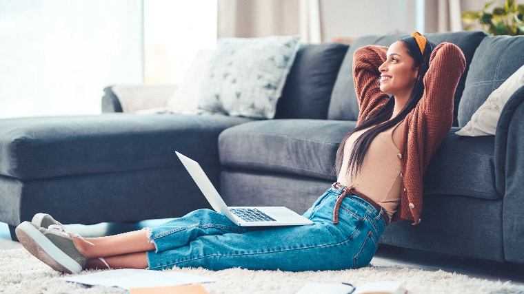Content woman with laptop.