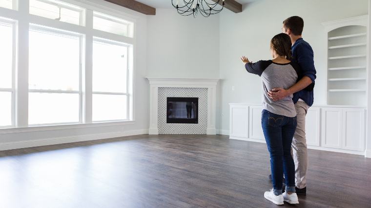 Couple touring a home for sale.