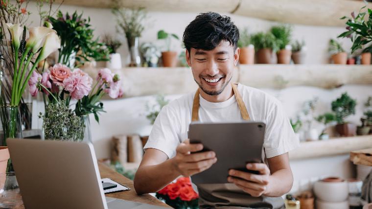 Young man using tablet.