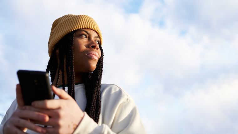 Young woman with phone.