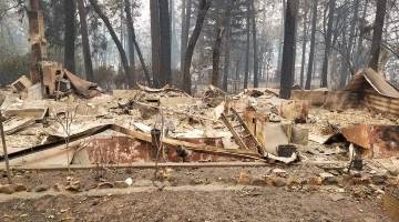 Ruined home following California wildfires