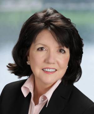 A corporate headshot of Cathy Mueller.