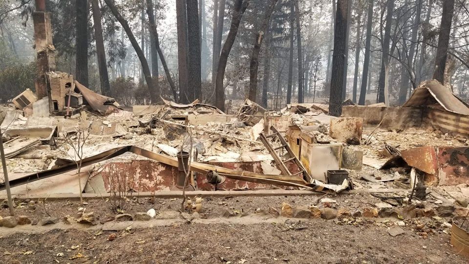 home devastated by wildfire