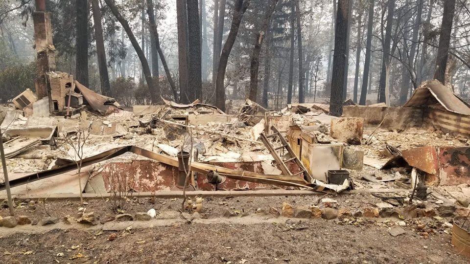 home devastated by wildfire